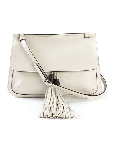 gucci white bag with 2 tassle wood|Gucci shoulder bag.